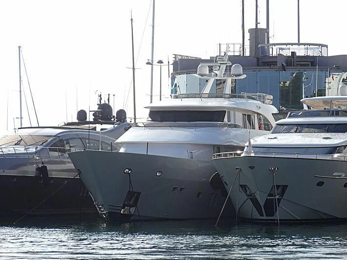 several white yachts in the water aboard ANDES Yacht for Sale