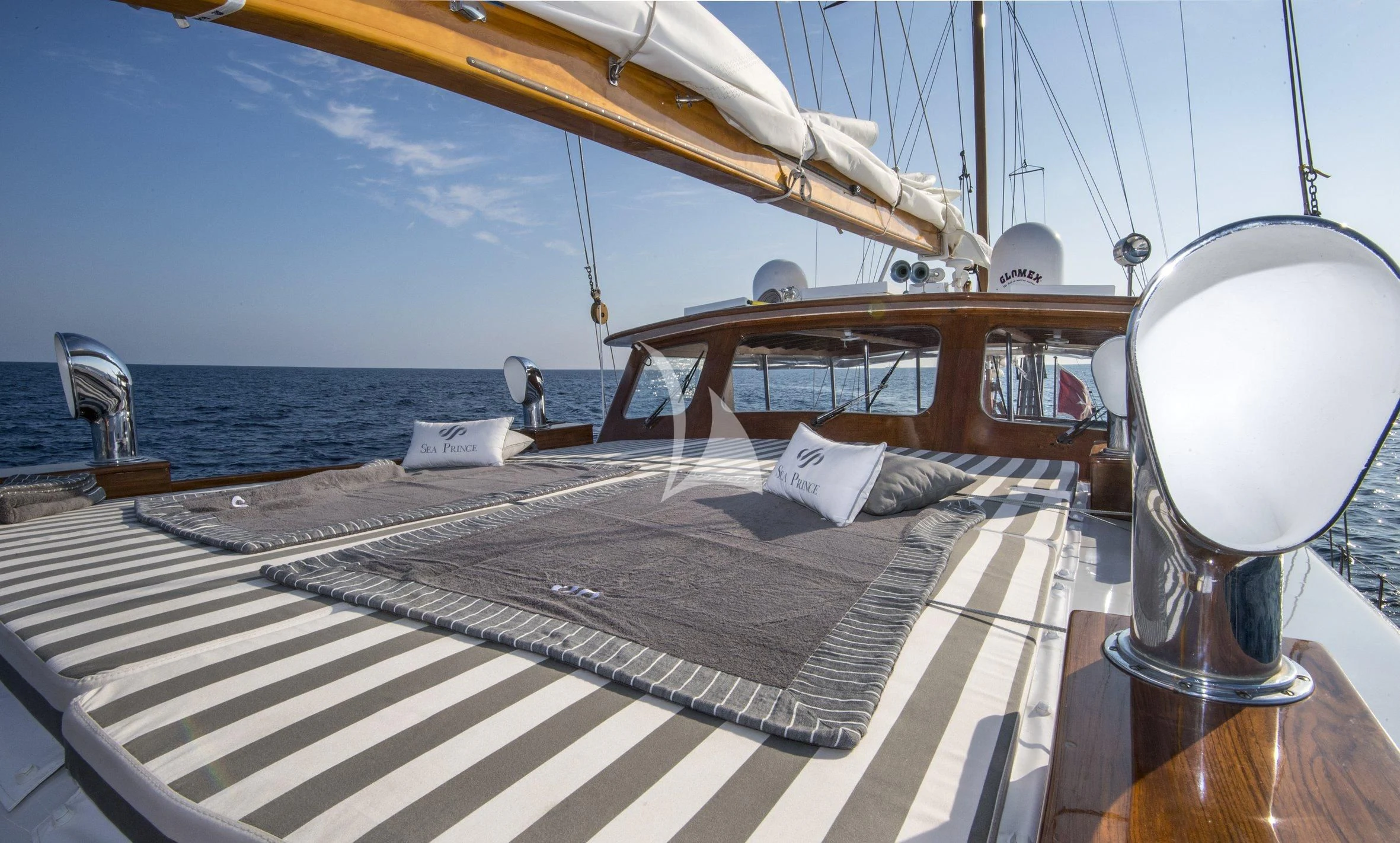 a boat with a white bed and a white lamp on the front aboard SEA PRINCE Yacht for Sale