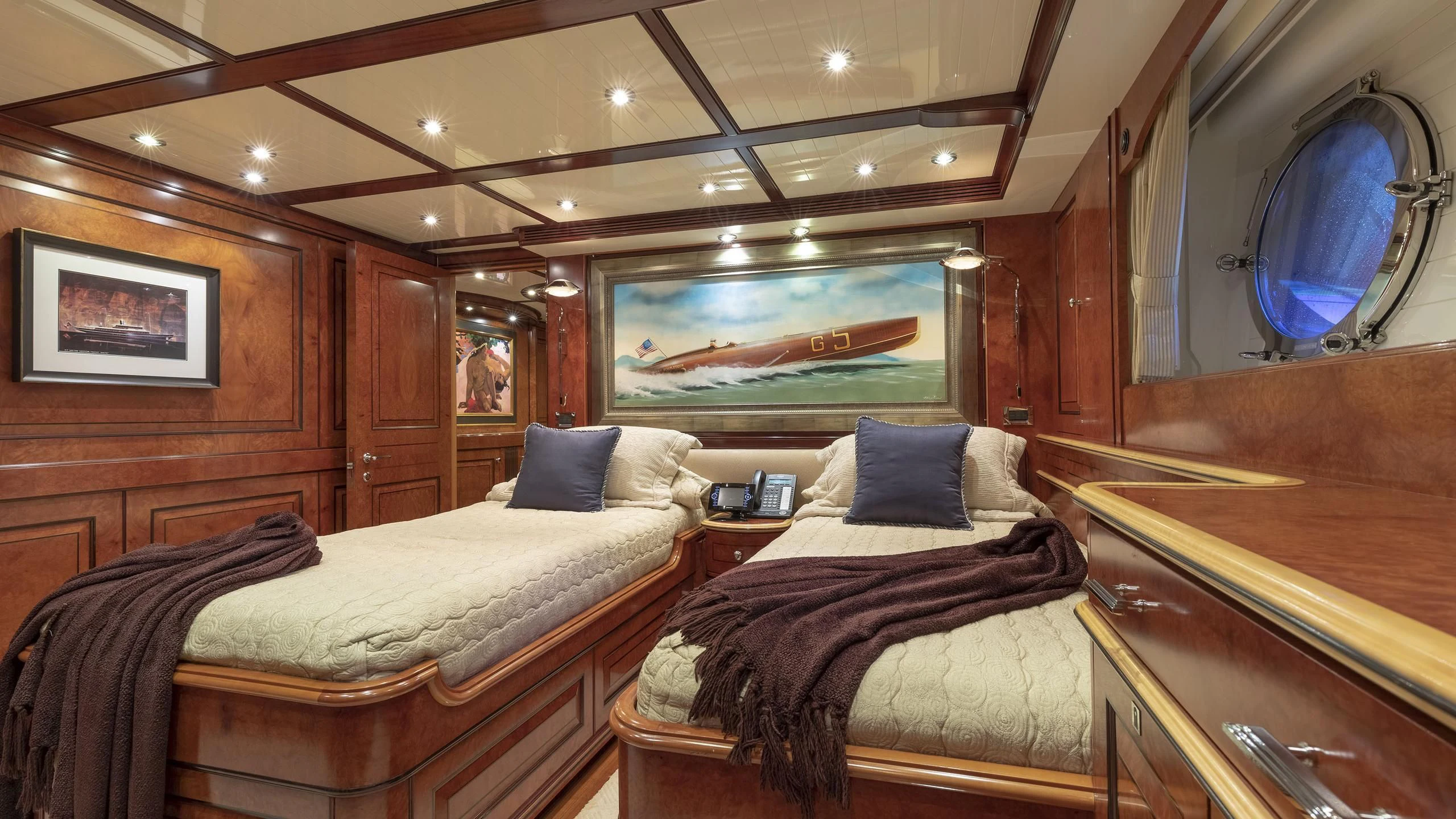 a room with two beds aboard NADAN Yacht for Sale