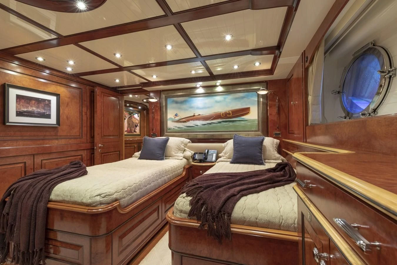 a room with two beds aboard NADAN Yacht for Sale