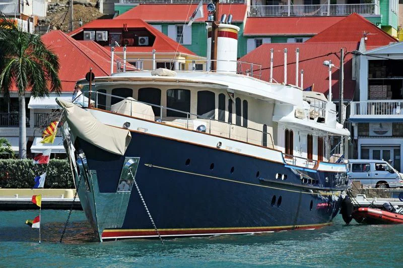 a boat docked in a harbor aboard NADAN Yacht for Sale