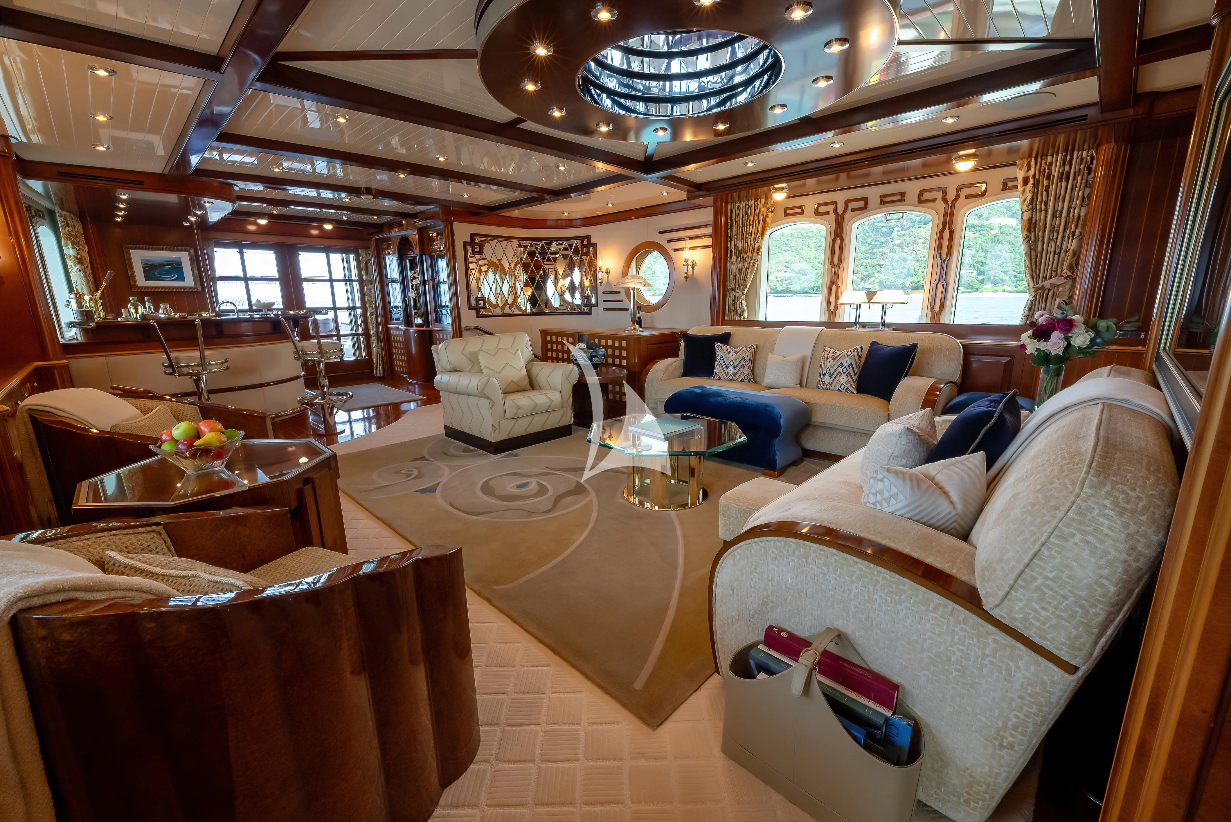 a living room with a large window aboard NADAN Yacht for Sale