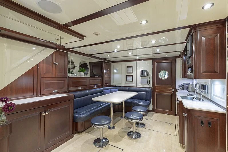 a kitchen and living room aboard NADAN Yacht for Sale