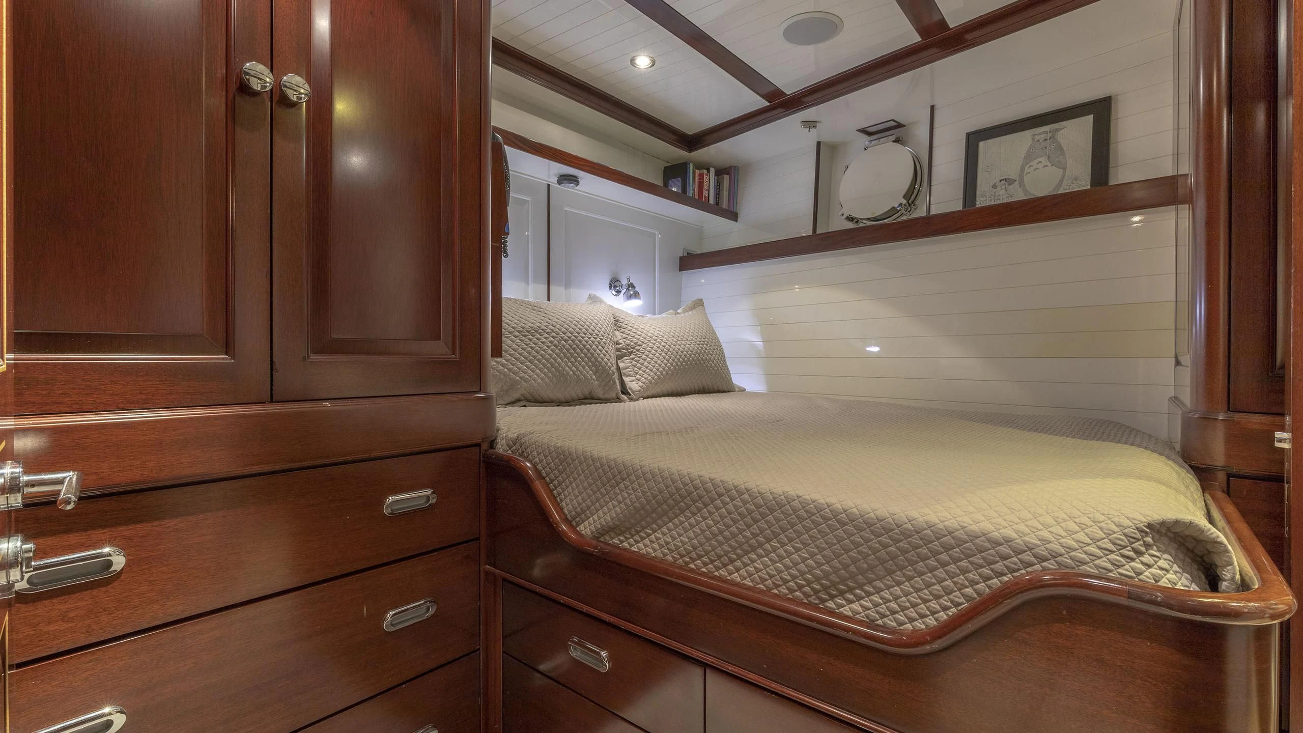 a bed in a room aboard NADAN Yacht for Sale