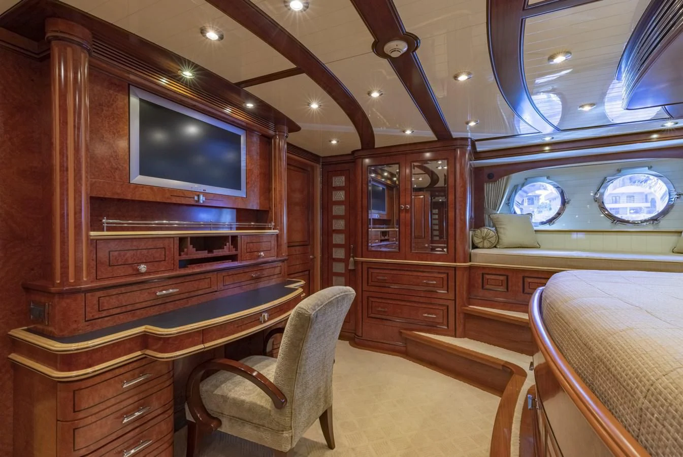 a room with a tv and a dresser aboard NADAN Yacht for Sale