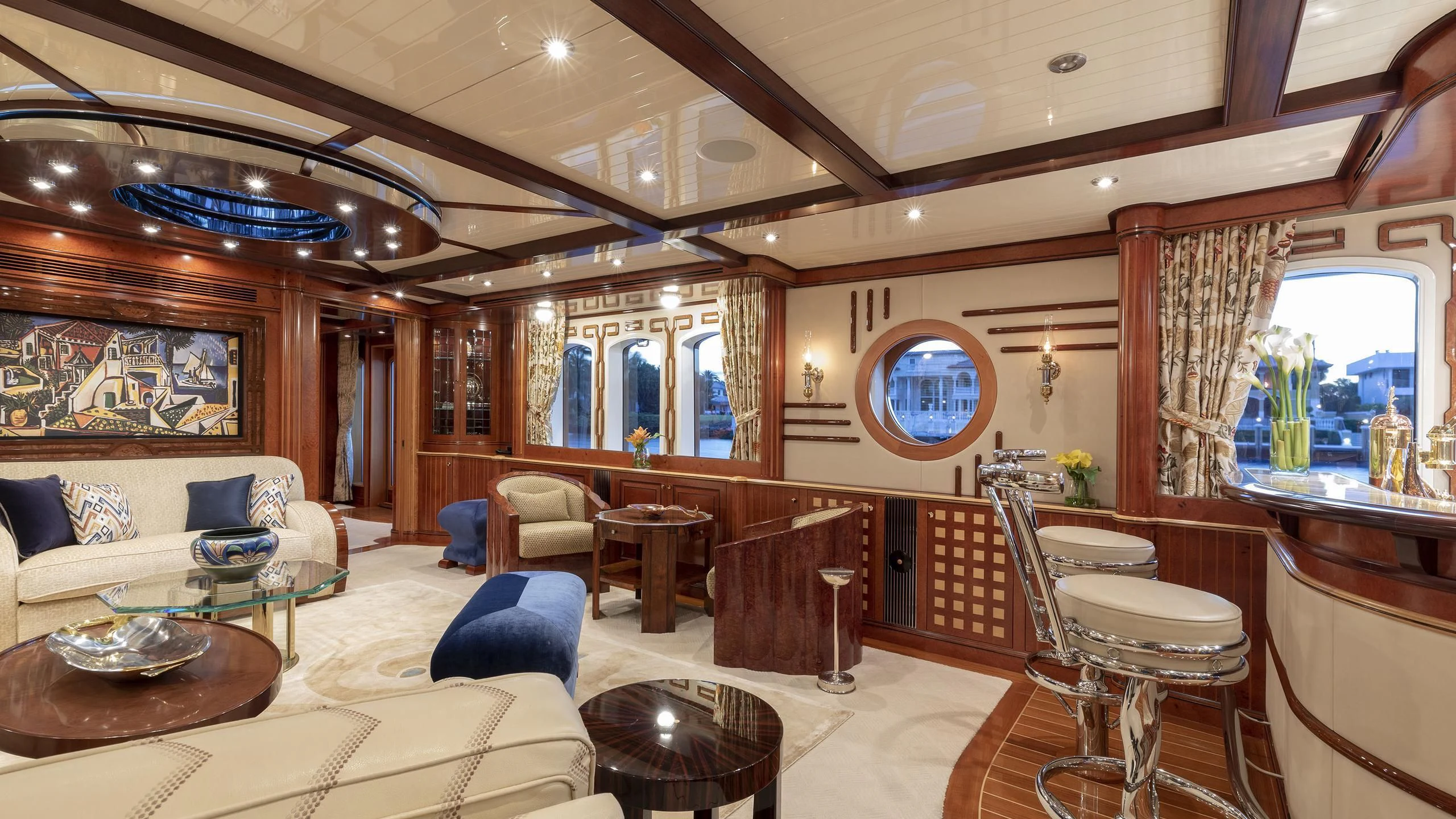 a large living room with a large window aboard NADAN Yacht for Sale