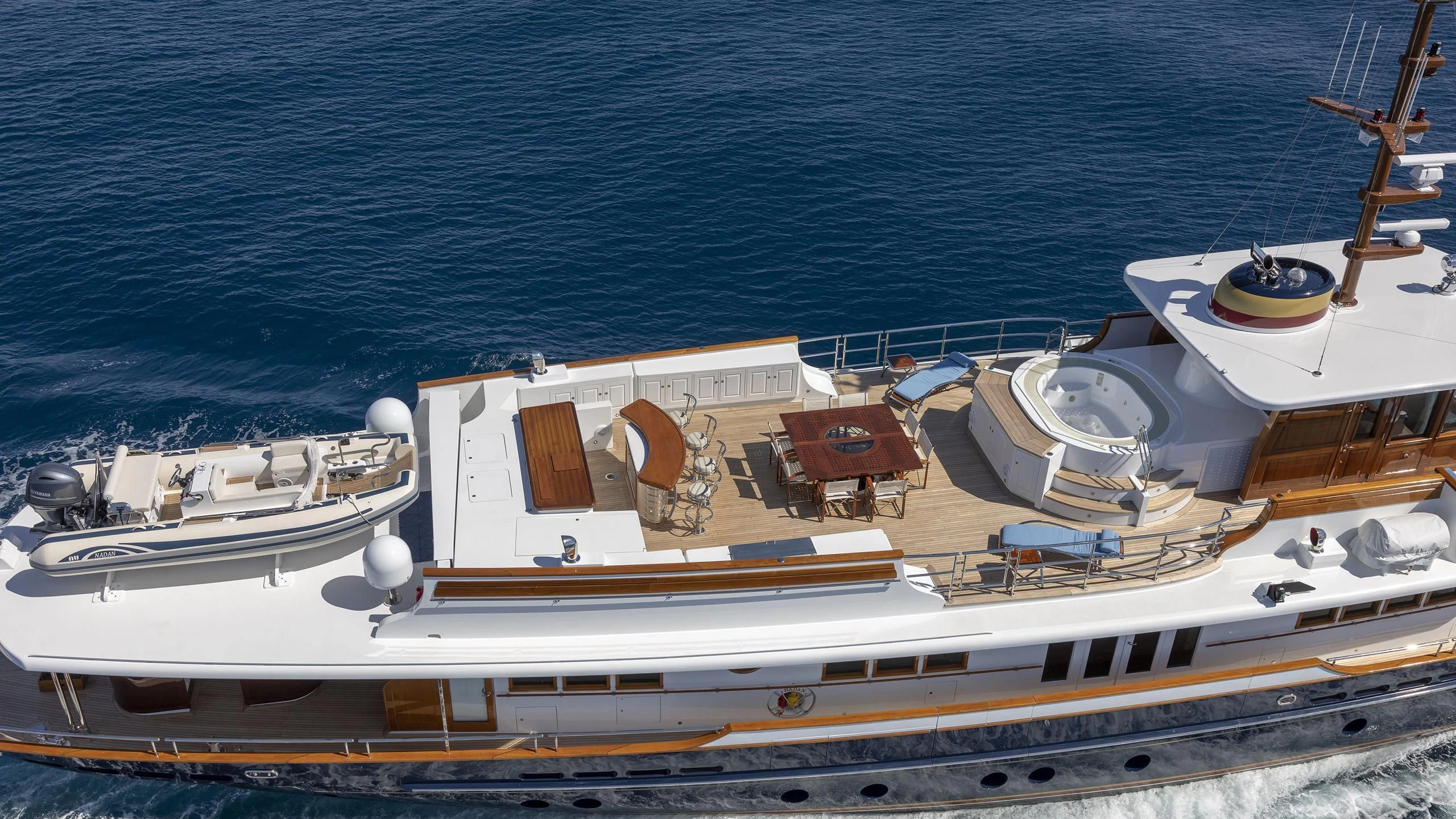 a boat docked at a pier aboard NADAN Yacht for Sale
