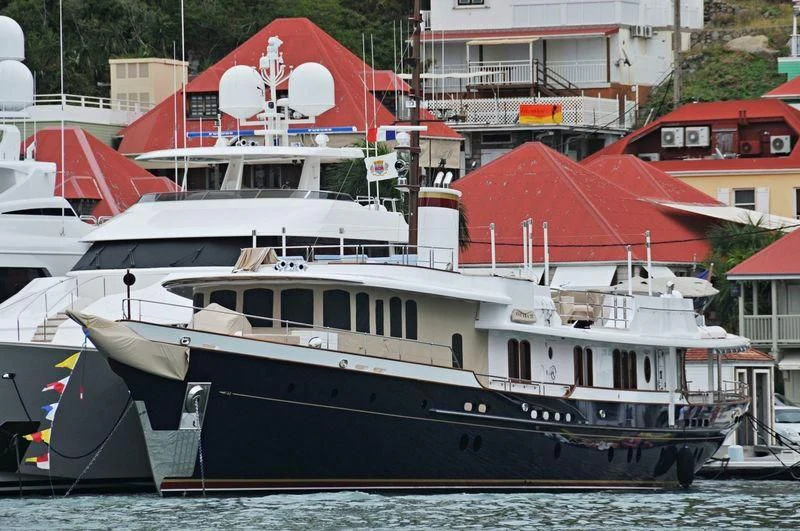 a boat docked in a harbor aboard NADAN Yacht for Sale