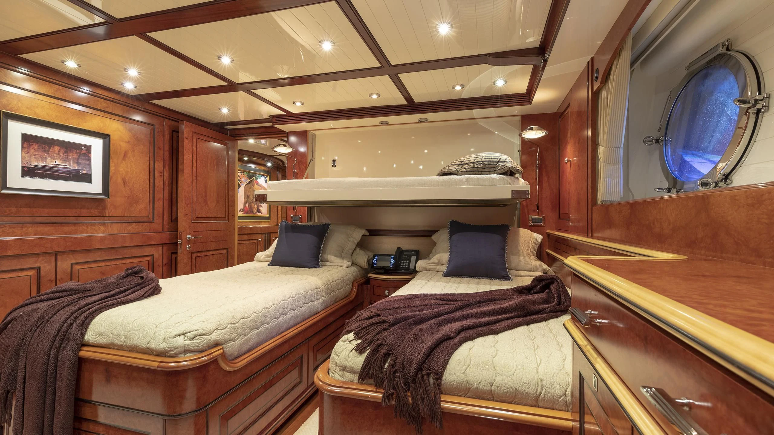 a room with two beds aboard NADAN Yacht for Sale