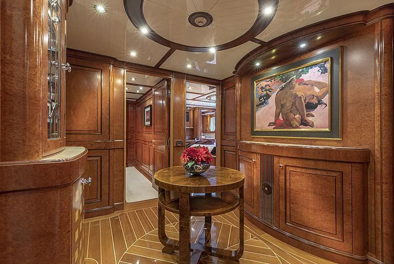 a room with a table and chairs aboard NADAN Yacht for Sale