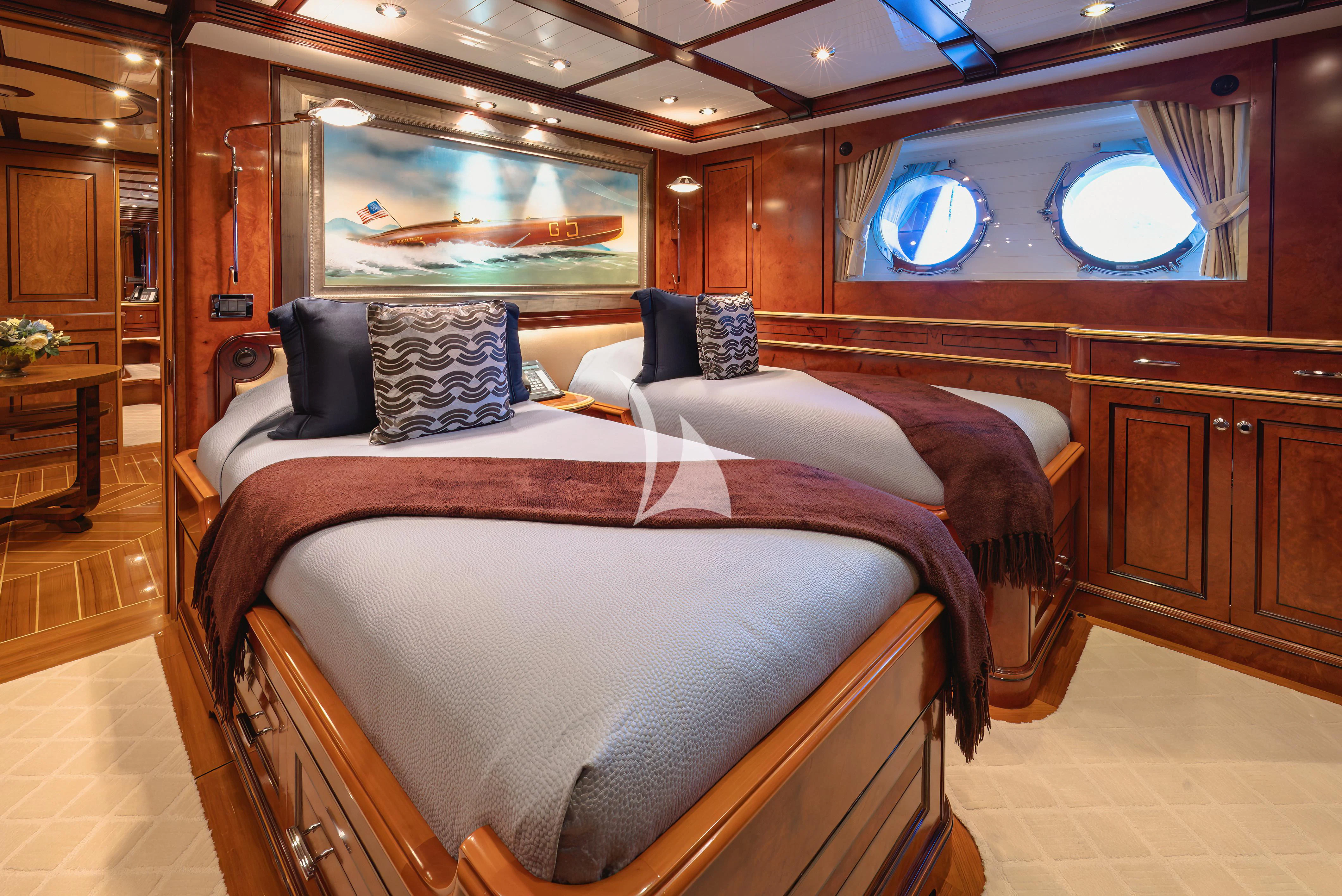 a bed in a room aboard NADAN Yacht for Sale