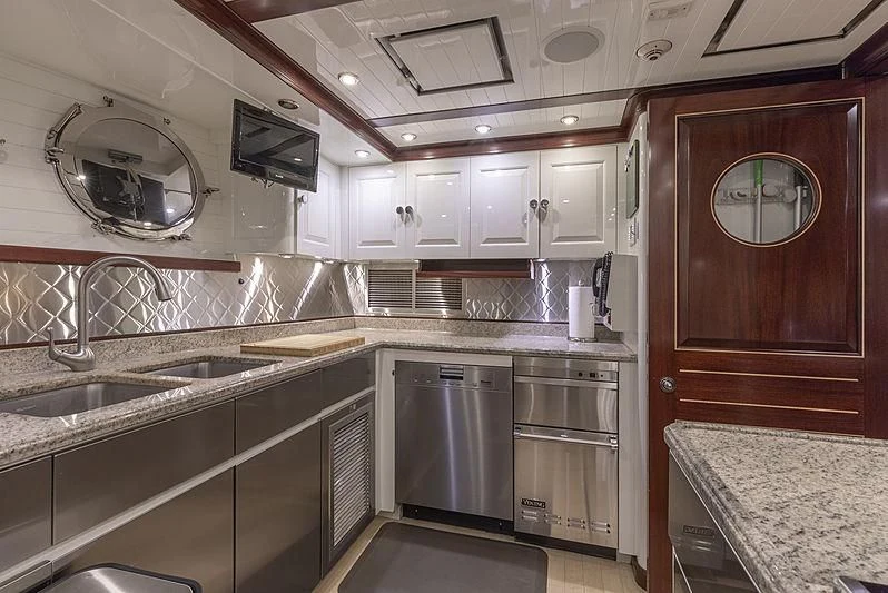a kitchen with a large sink aboard NADAN Yacht for Sale