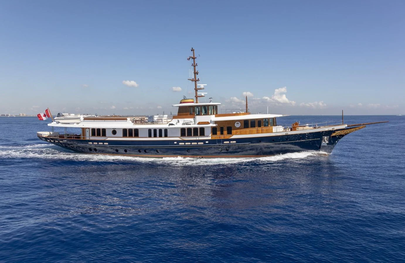 a large ship in the water aboard NADAN Yacht for Sale