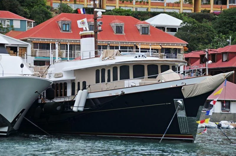 a boat docked at a pier aboard NADAN Yacht for Sale