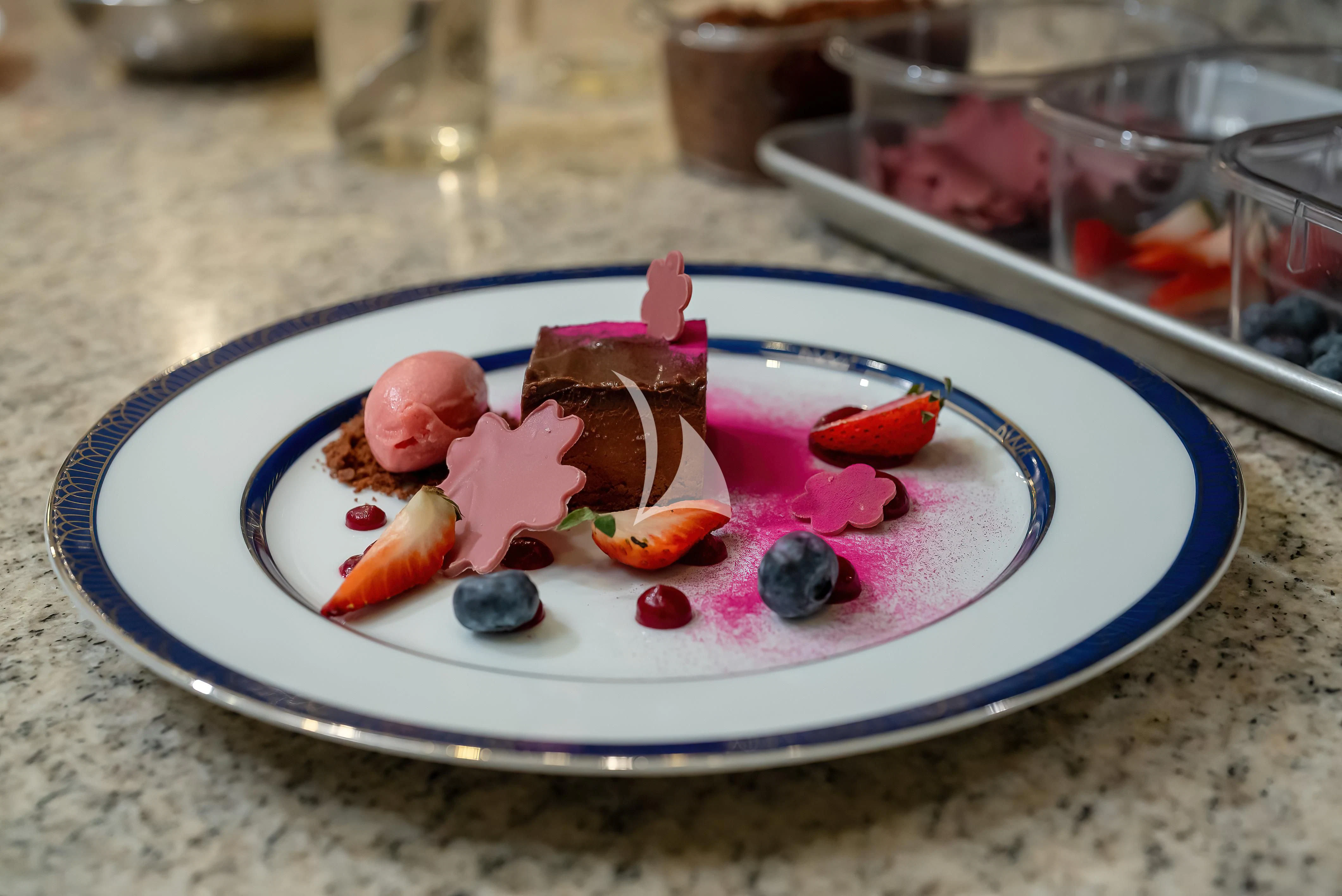 a plate of food aboard NADAN Yacht for Sale