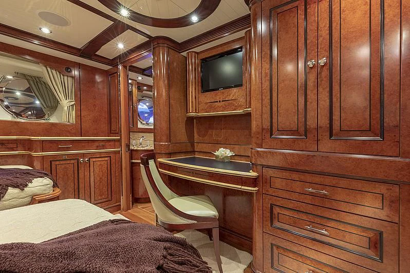 a room with a table and chairs aboard NADAN Yacht for Sale
