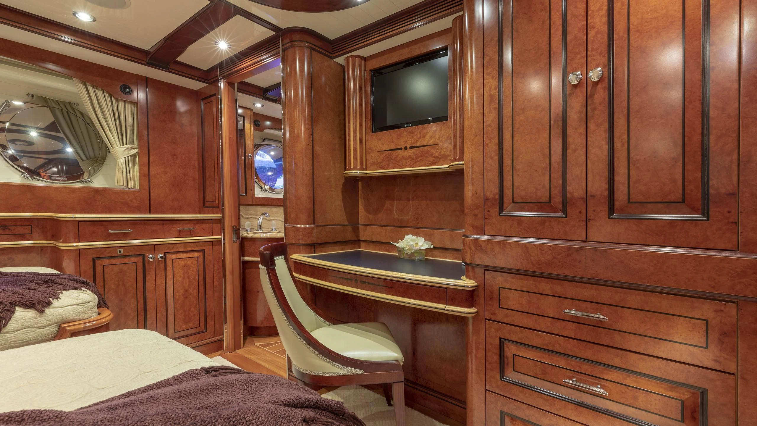 a room with a table and chairs aboard NADAN Yacht for Sale