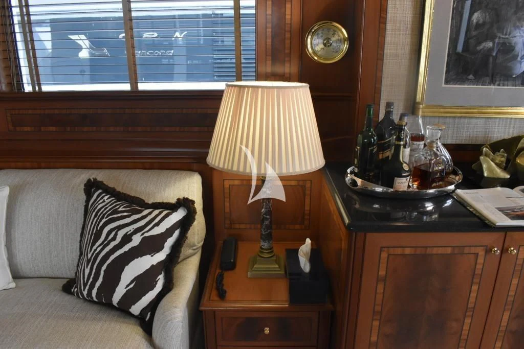 a lamp on a table aboard OKTANA Yacht for Sale