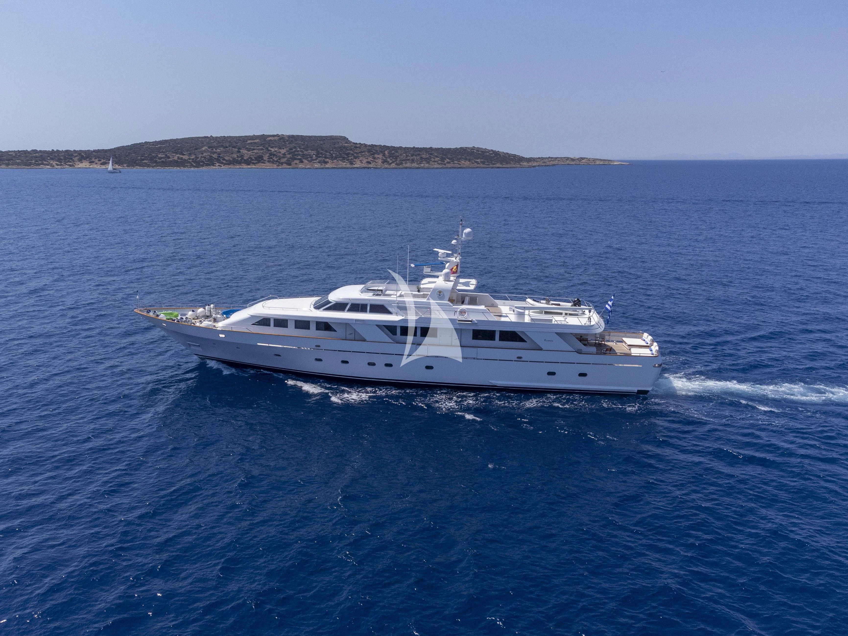 a white yacht in the water aboard OKTANA Yacht for Sale