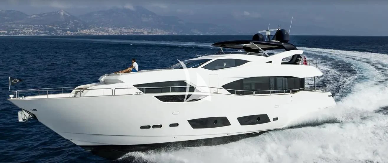 a white yacht on the water aboard MIRRACLE Yacht for Sale