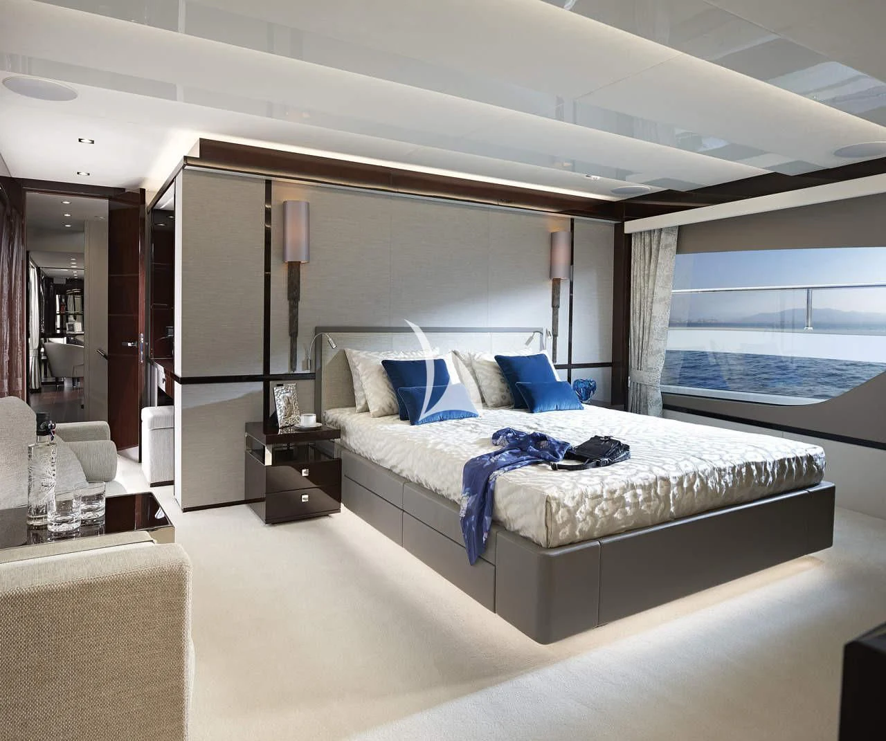 a bedroom with a large bed aboard MIRRACLE Yacht for Sale