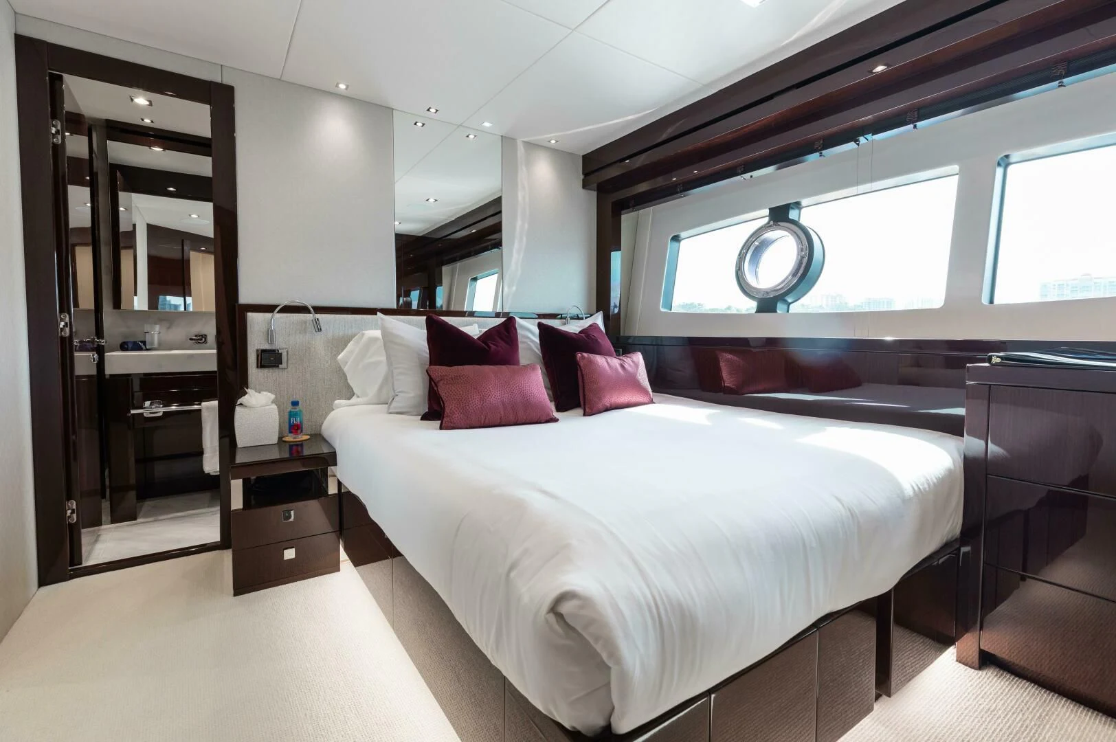 a bed in a room aboard MIRRACLE Yacht for Sale