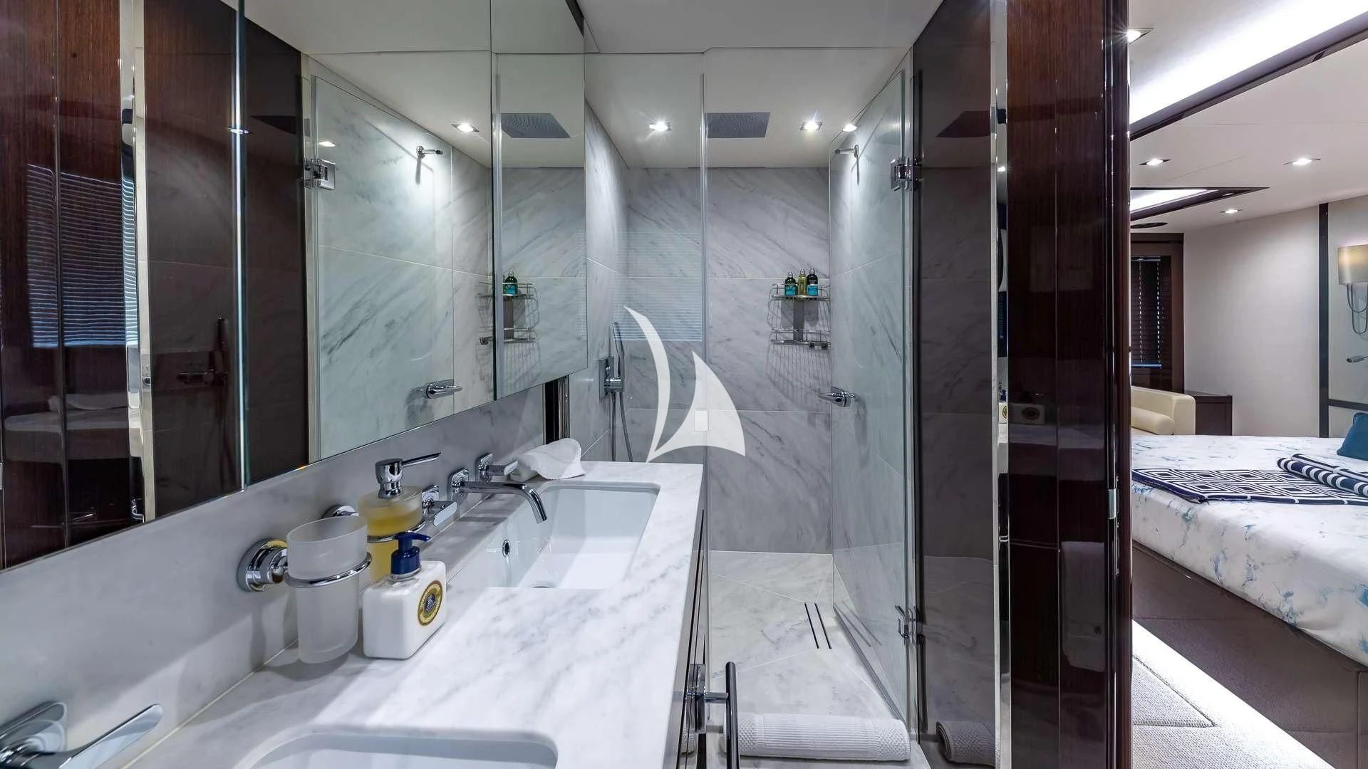 a bathroom with a glass shower aboard MIRRACLE Yacht for Sale