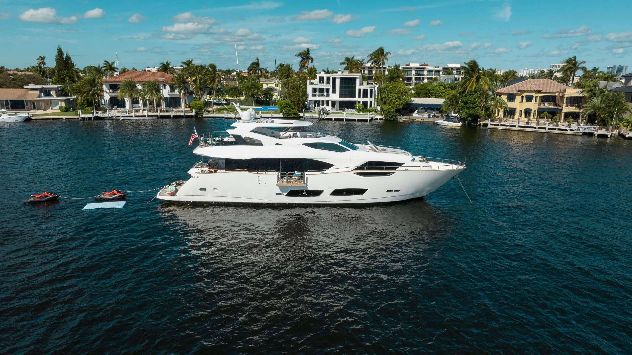 a white boat in the water aboard MIRRACLE Yacht for Sale