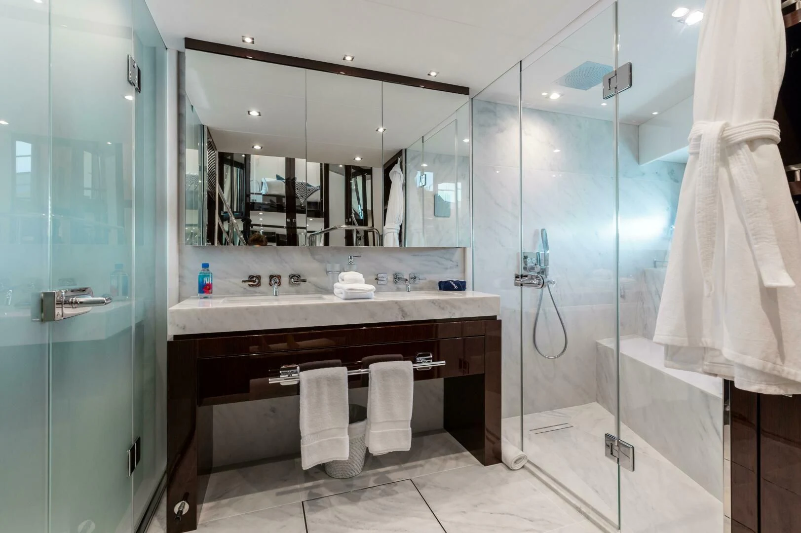 a bathroom with a glass shower aboard MIRRACLE Yacht for Sale
