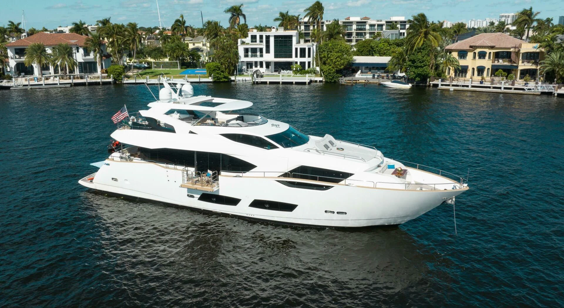 a white yacht on the water aboard MIRRACLE Yacht for Sale