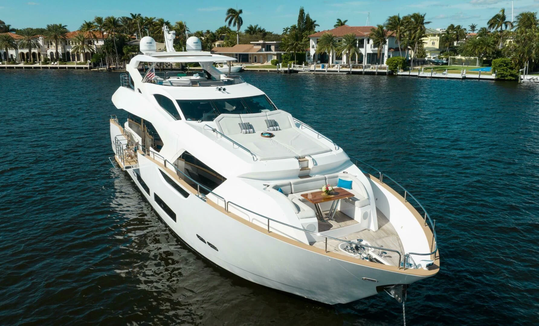 a white yacht on the water aboard MIRRACLE Yacht for Sale