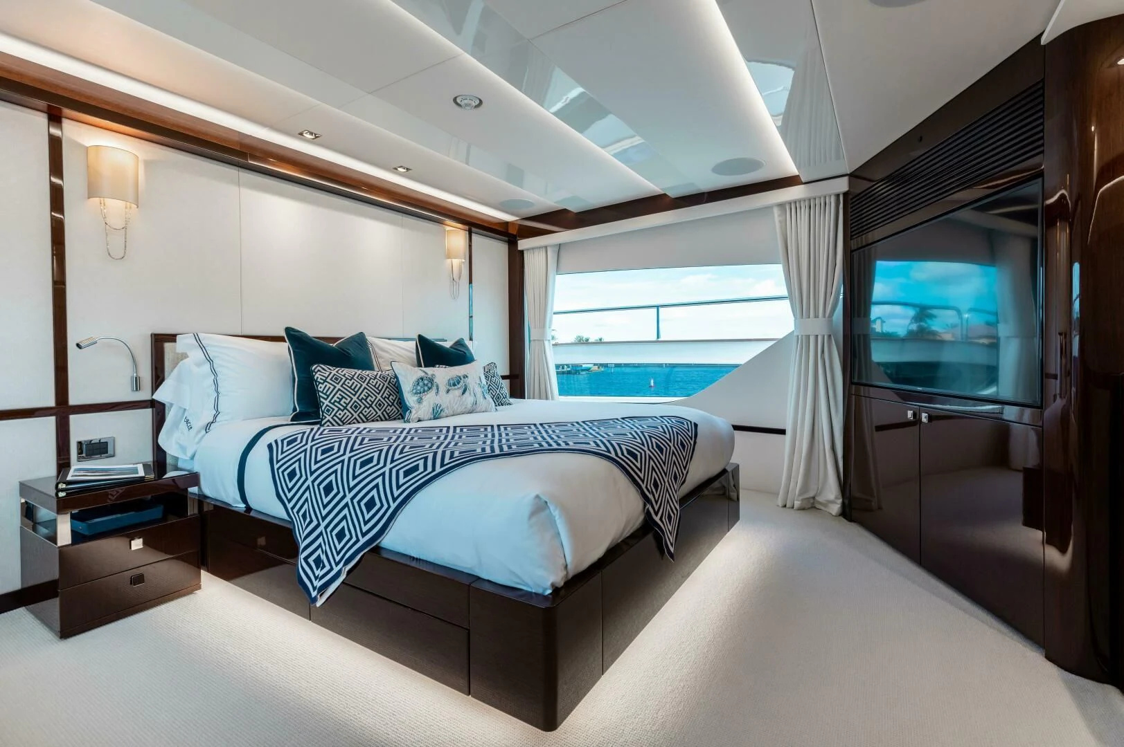 a bed in a room aboard MIRRACLE Yacht for Sale
