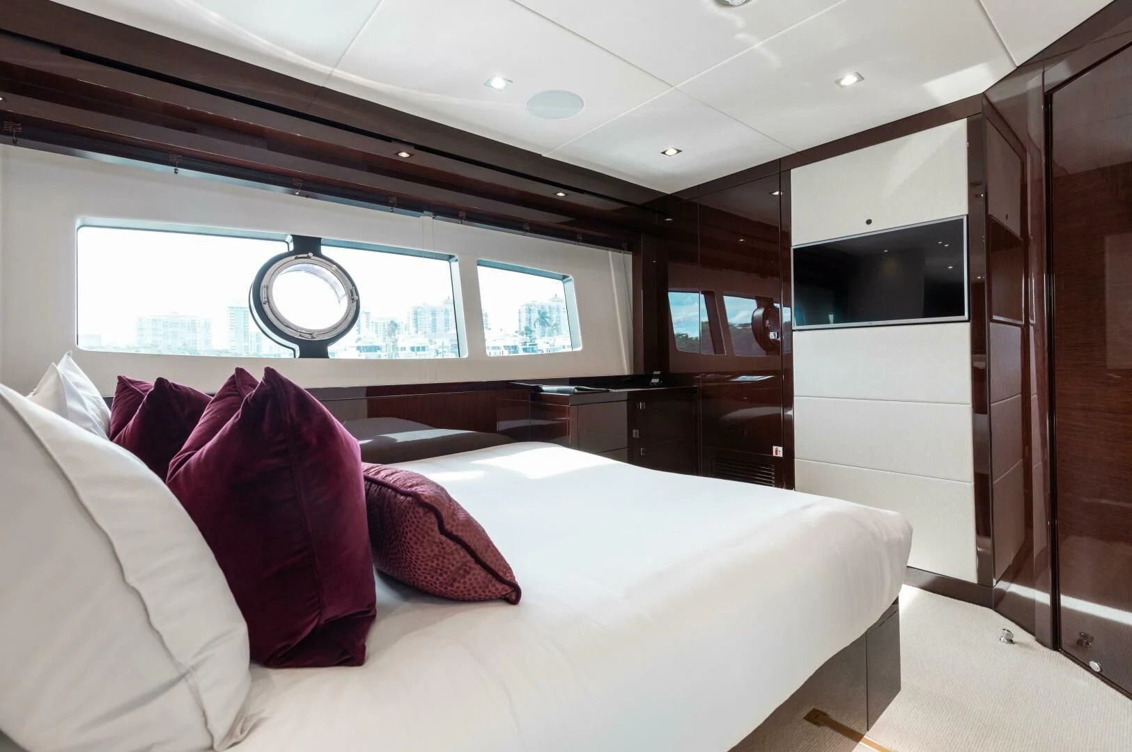 a bed in a room aboard MIRRACLE Yacht for Sale