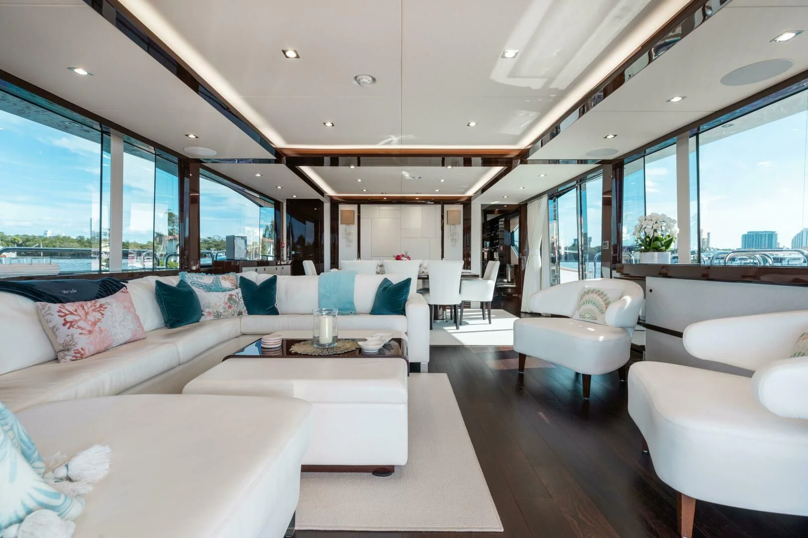 a room with a bed and a couch aboard MIRRACLE Yacht for Sale