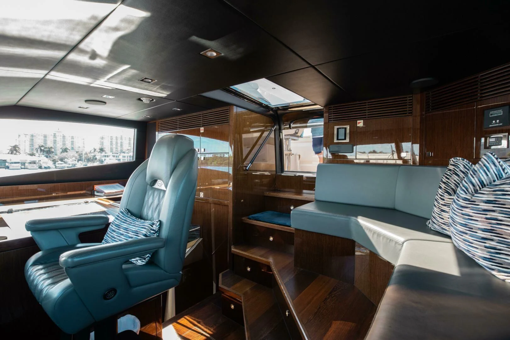 a room with a view of a city and a lake aboard MIRRACLE Yacht for Sale
