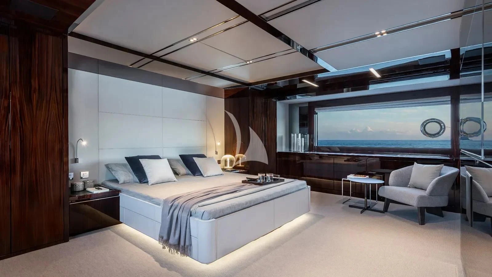 a room with a bed and a large screen aboard DON'T WORRY Yacht for Sale