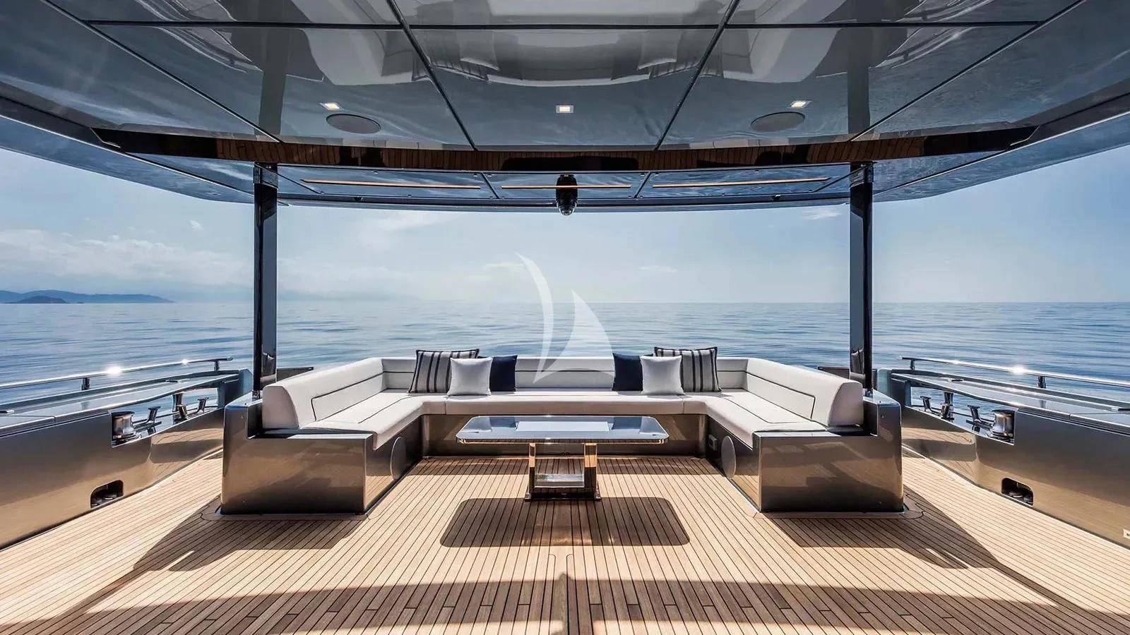 a room with a couch and a table and a view of the ocean aboard DON'T WORRY Yacht for Sale