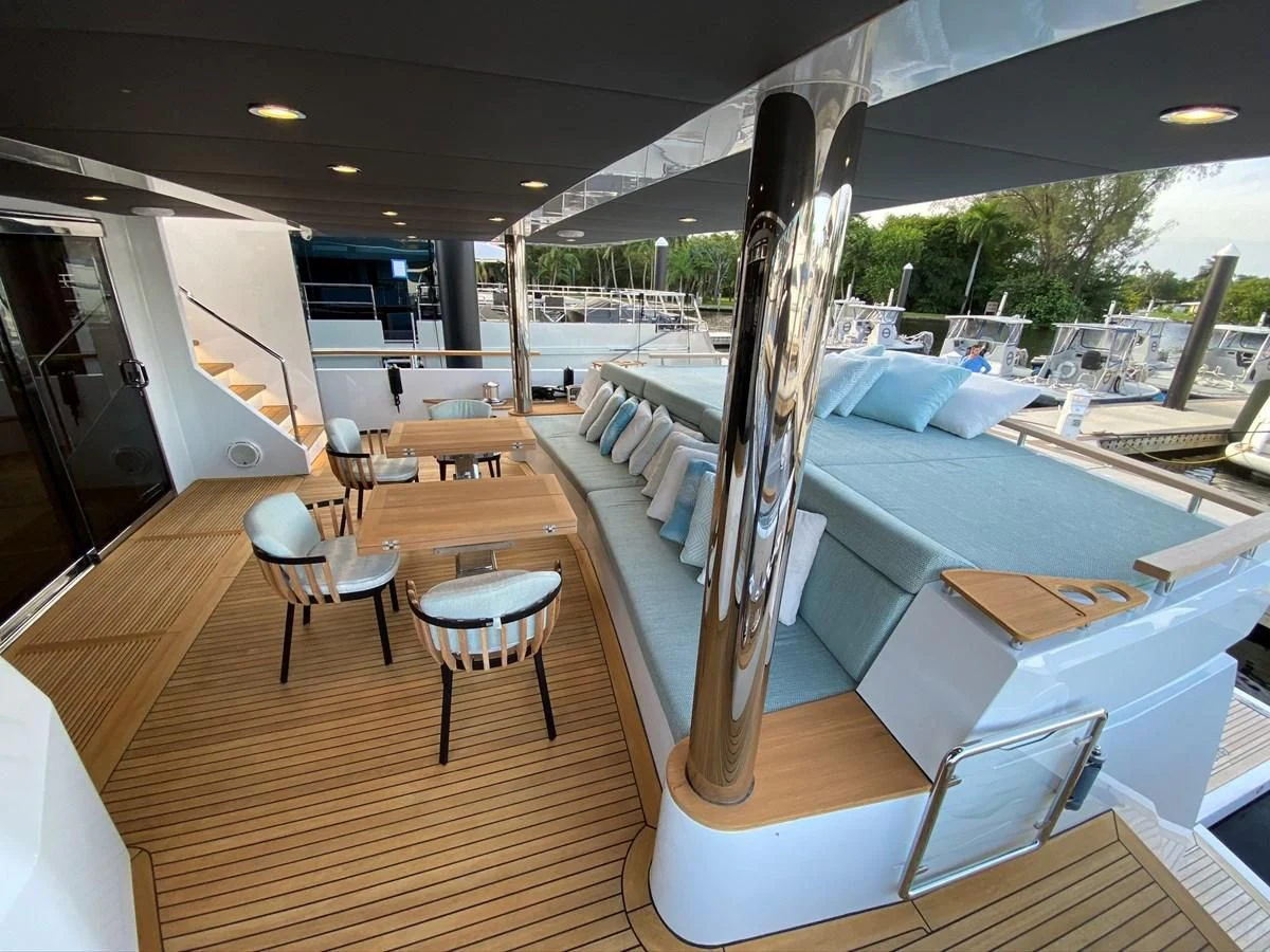 a boat on a deck aboard PERSISTENCE Yacht for Sale