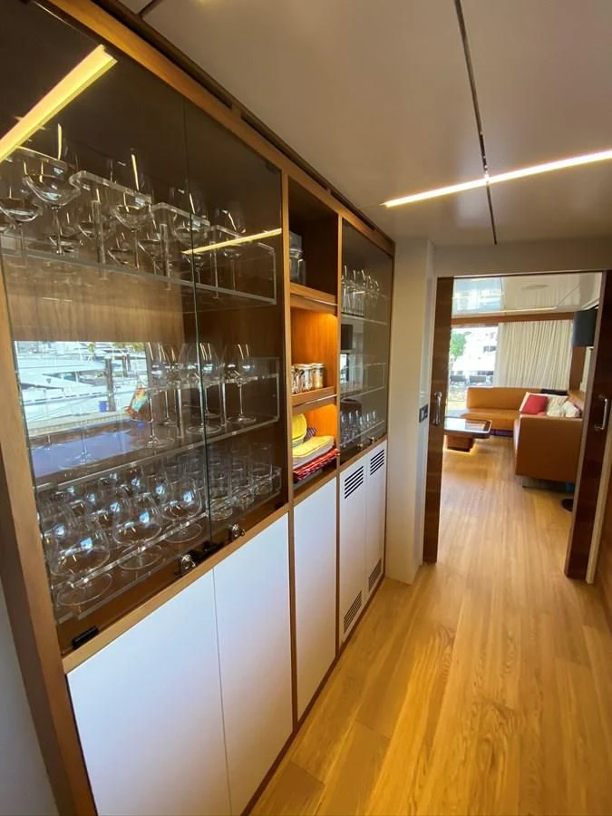 a kitchen with glass walls aboard PERSISTENCE Yacht for Sale