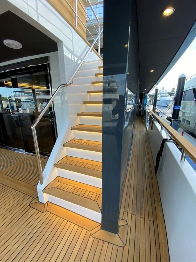 a staircase in a building aboard PERSISTENCE Yacht for Sale