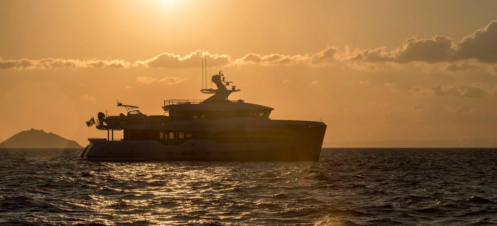 a military ship in the water aboard PERSISTENCE Yacht for Sale