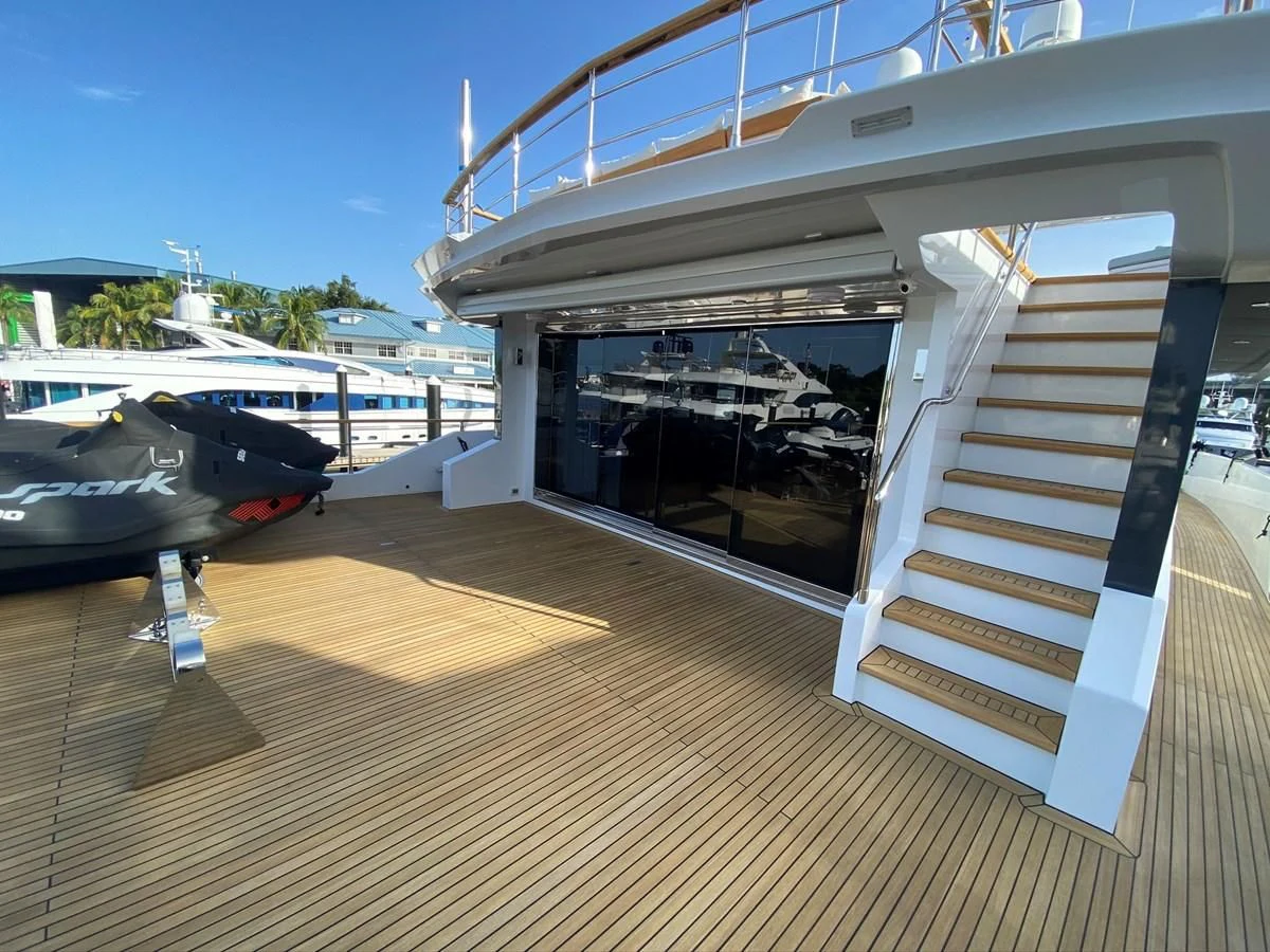 a white staircase leading to a plane aboard PERSISTENCE Yacht for Sale