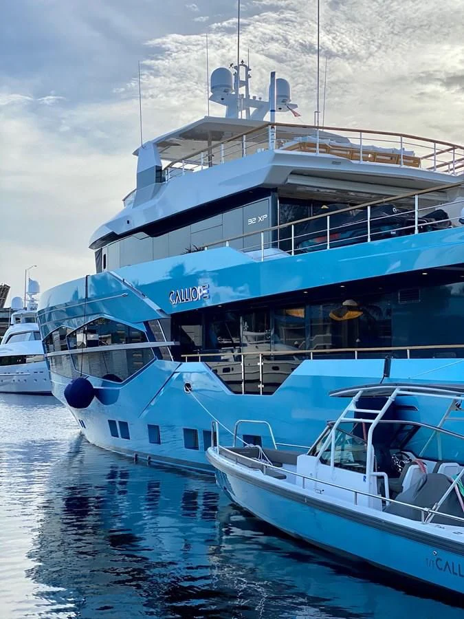 a couple of boats are parked in the water aboard PERSISTENCE Yacht for Sale