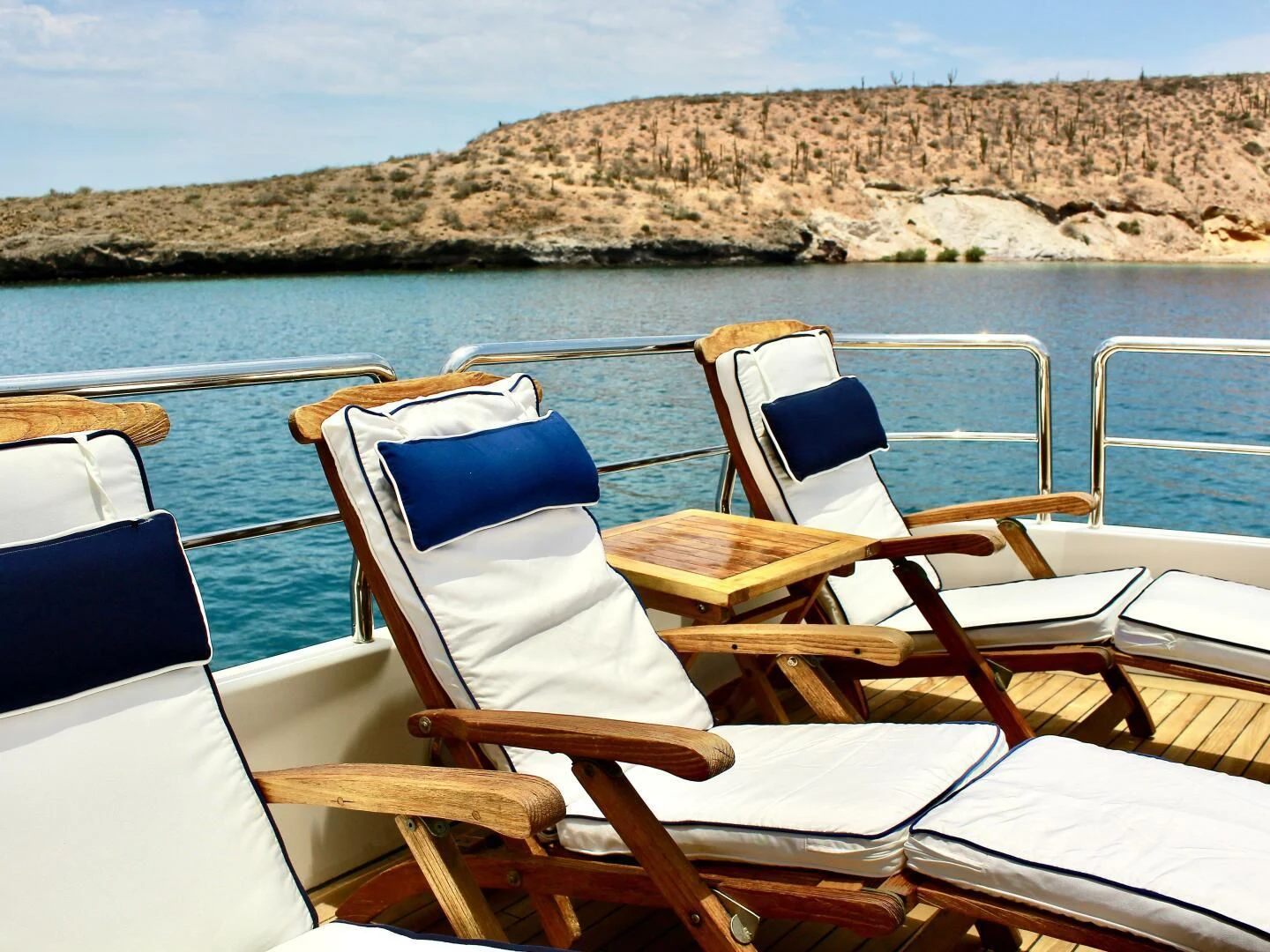 a row of boats on a lake aboard GARI Yacht for Sale