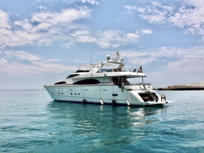 a white yacht in the water aboard GARI Yacht for Sale