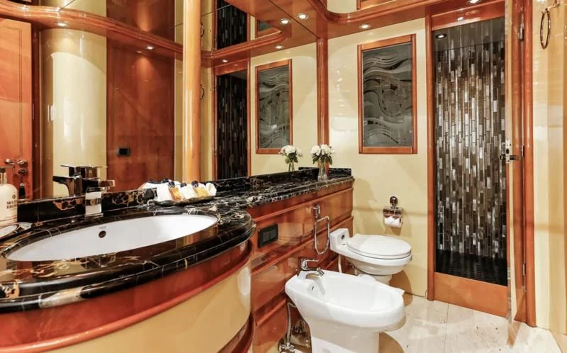 a bathroom with a sink and a toilet aboard TIFFANY Yacht for Sale