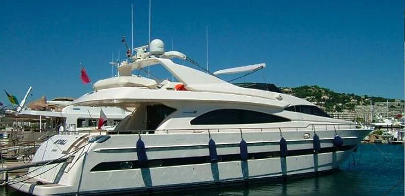 a boat docked at a pier aboard TIFFANY Yacht for Sale