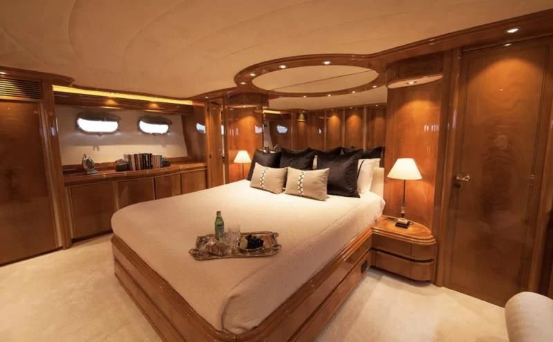 a bed in a hotel room aboard TIFFANY Yacht for Sale