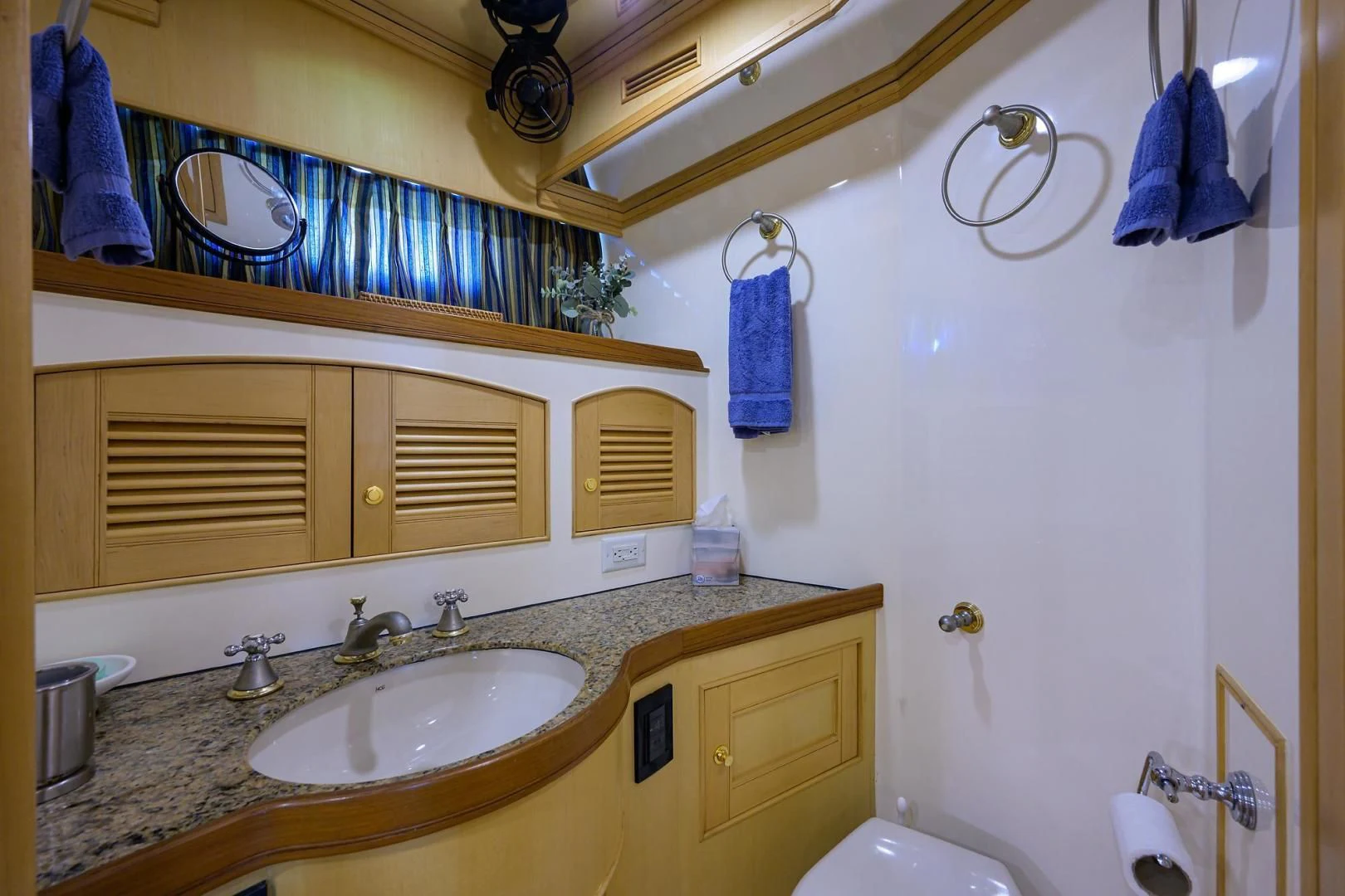 a bathroom with a sink and a mirror aboard BELLA Yacht for Sale