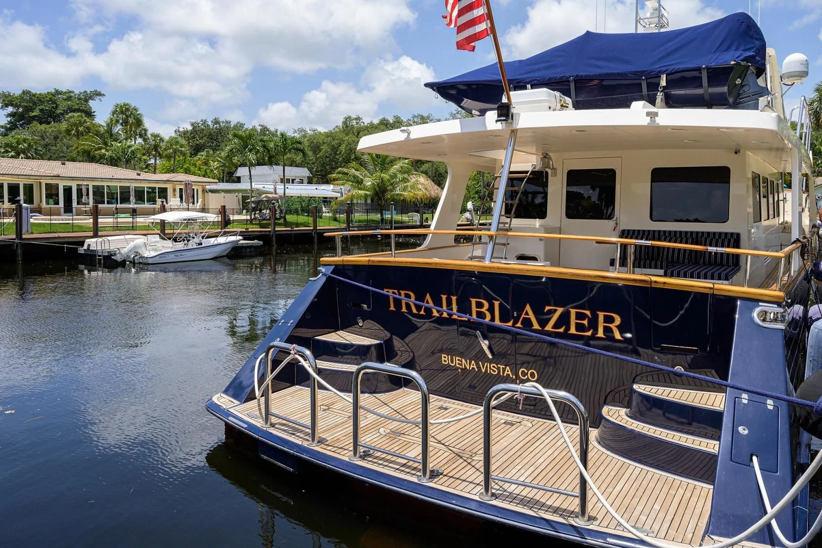a boat docked at a pier aboard BELLA Yacht for Sale
